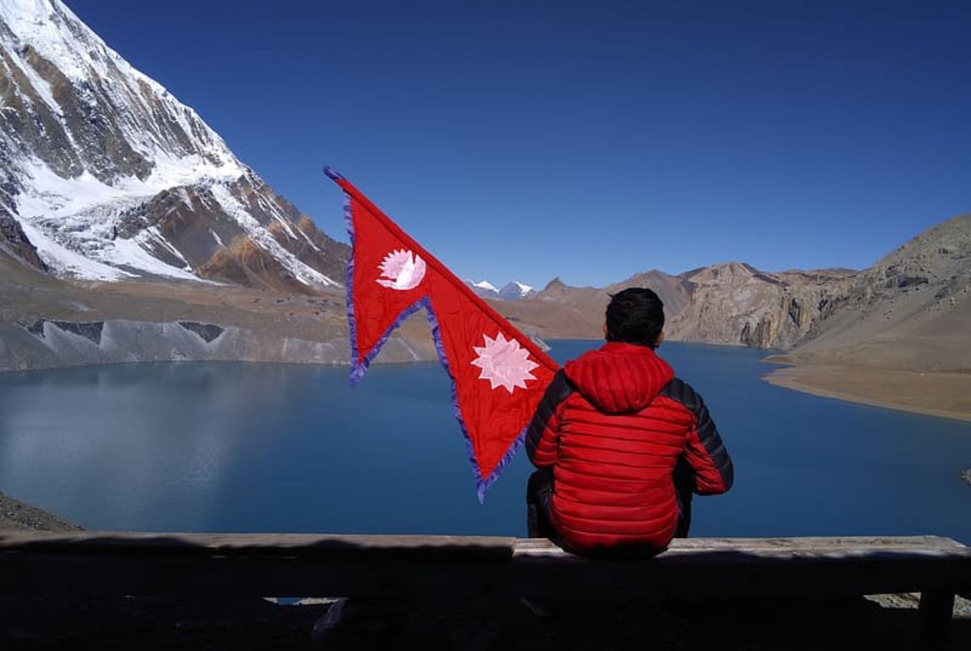 Trekkers walking in Nepal's Himalayas showing Nepal's unique trekking culture